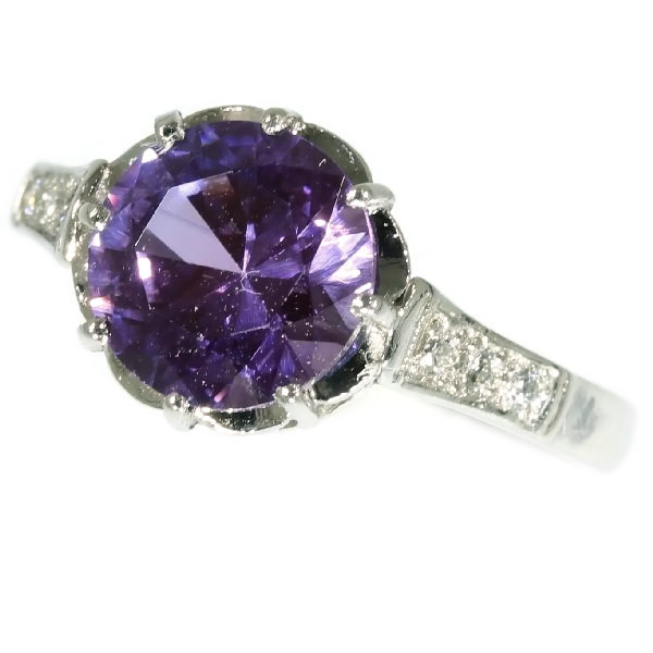 Estate platinum engagement ring set with diamonds and amethyst